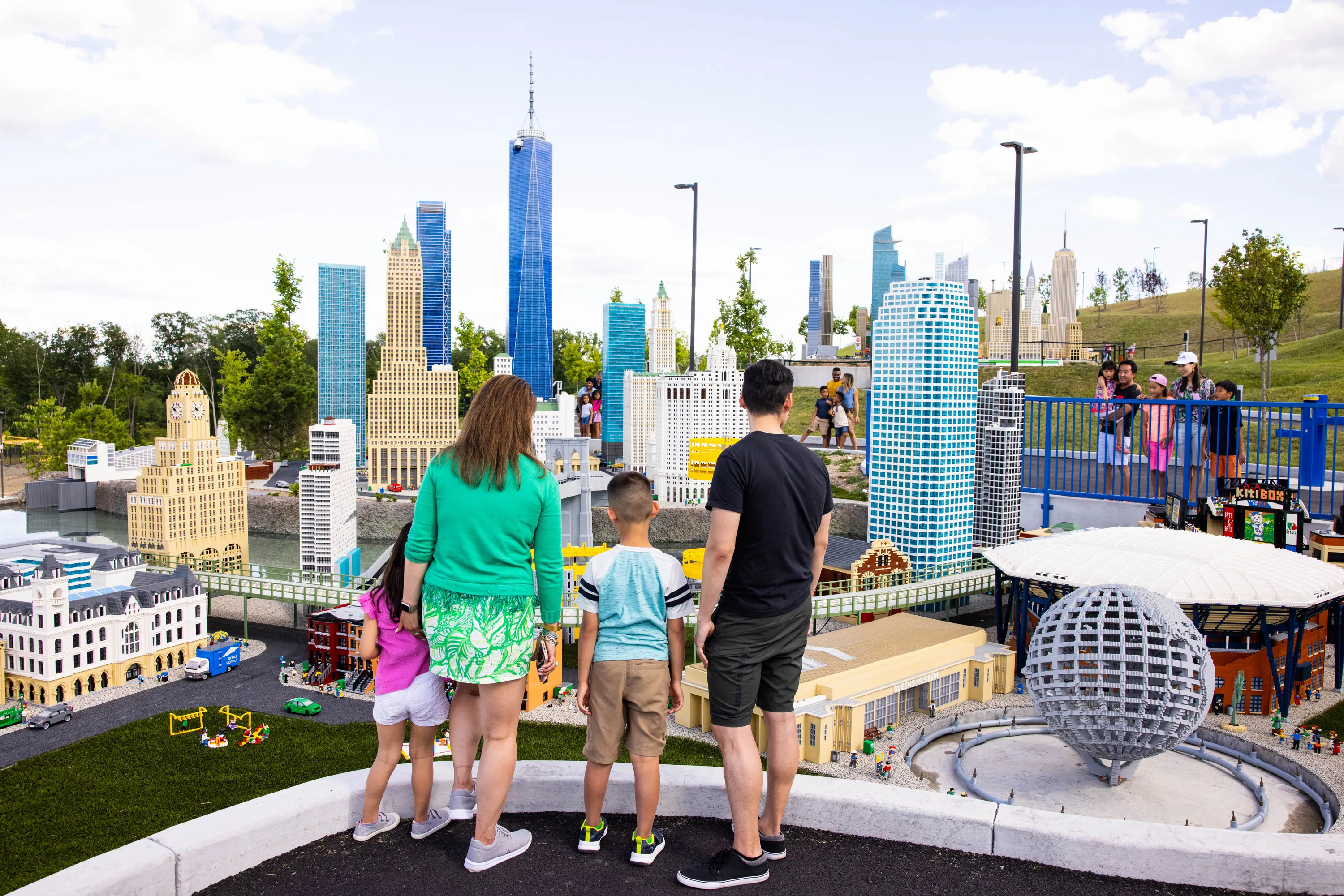 Family looks at New York MINILAND