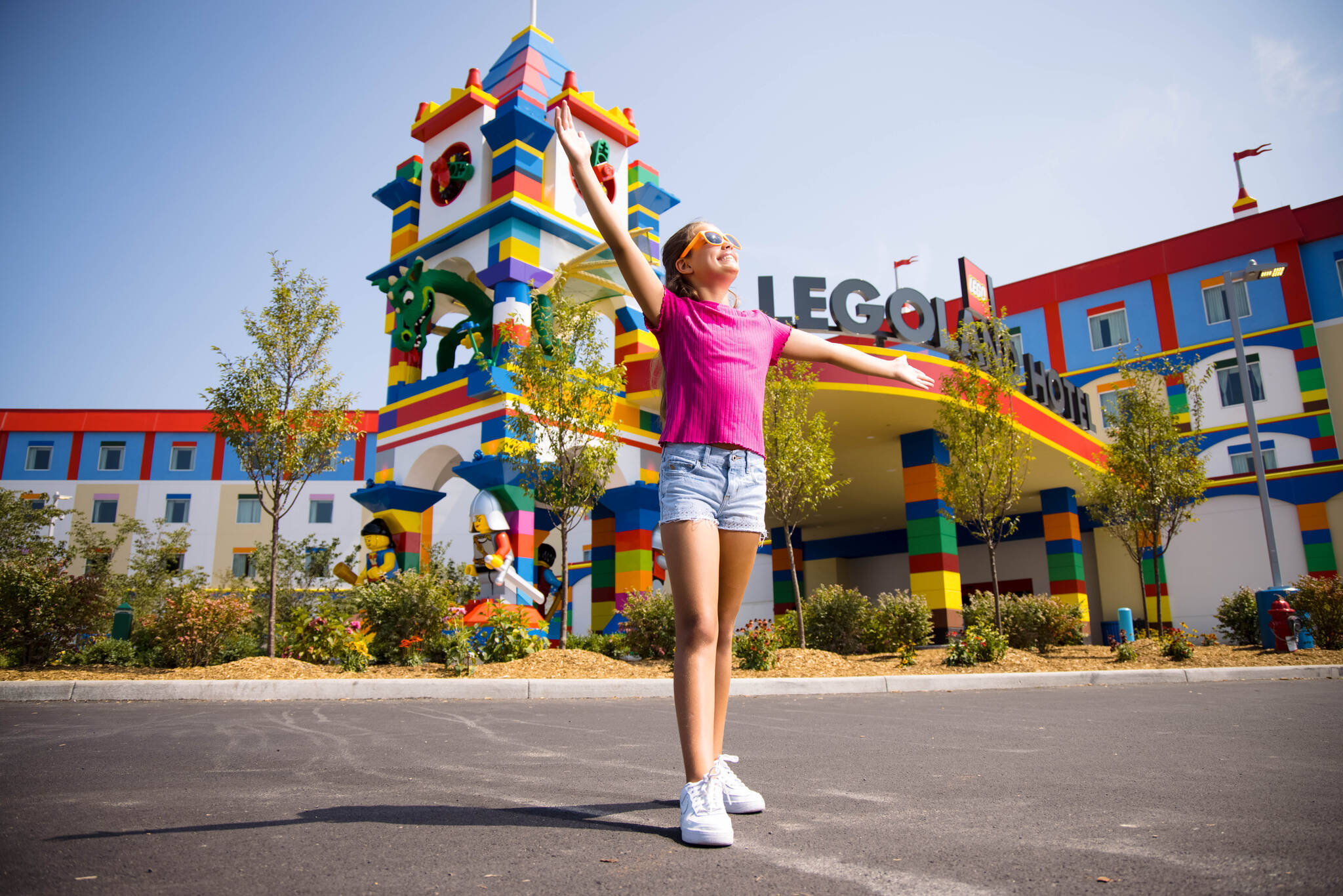 Girl Poses in Front of the LEGOLAND Hotel