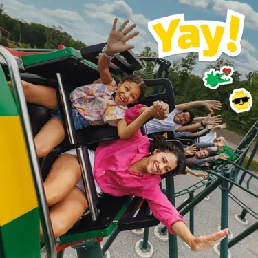 Mom and daughter ride the dragon coaster